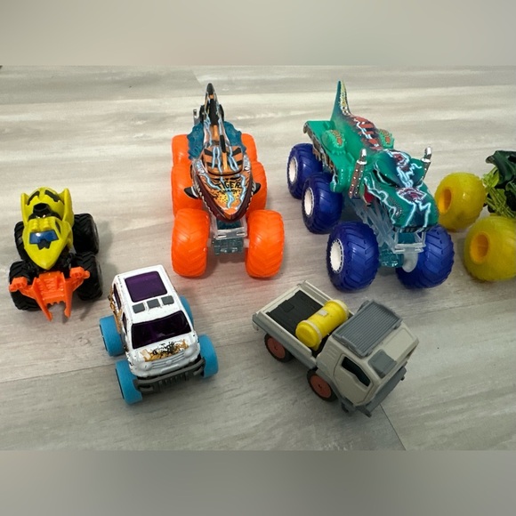 Monster Truck Toy cars with Orange, Blue, and Yellow Wheels set of 7 - Picture 3 of 5